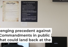 Students work under posters of the Ten Commandments and the Bill of Rights in a high school classroom in Kyle, Texas, on Oct. 16, 2025. AP Photo/Eric Gay